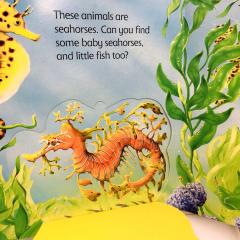 Under the sea книга на английском языке для детей от издательства Usborne с открывающимися окошками