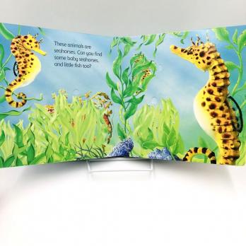 Under the sea книга на английском языке для детей от издательства Usborne с открывающимися окошками